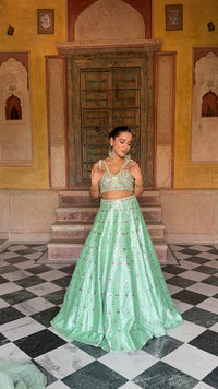 Elegant Raw Silk Lehenga with Intricate Mirror Work