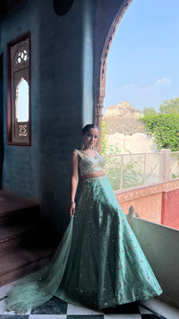 Elegant Raw Silk Lehenga with Intricate Mirror Work