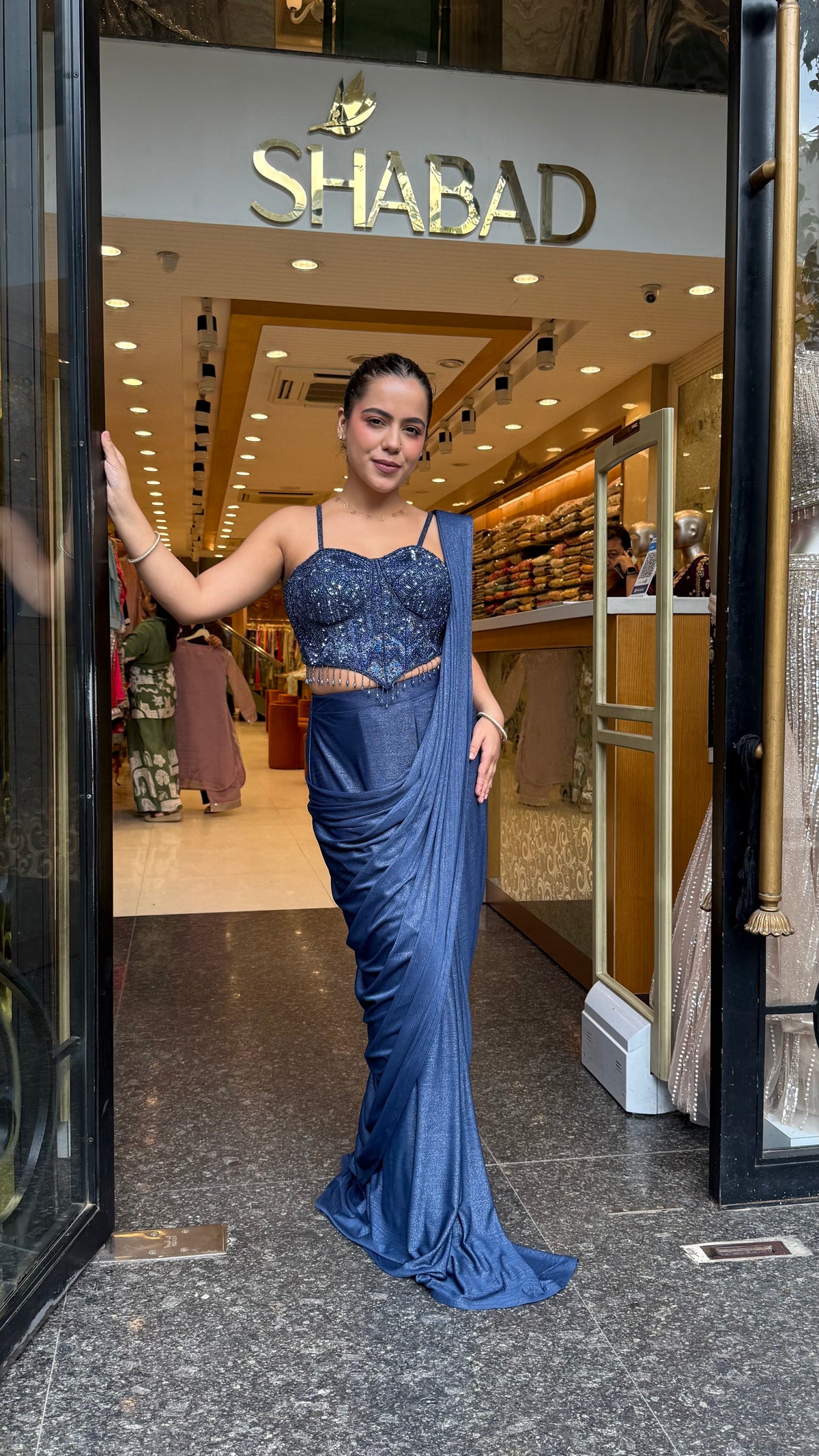 Shimmer Lycra Drape Saree with Handwork Corset Blouse