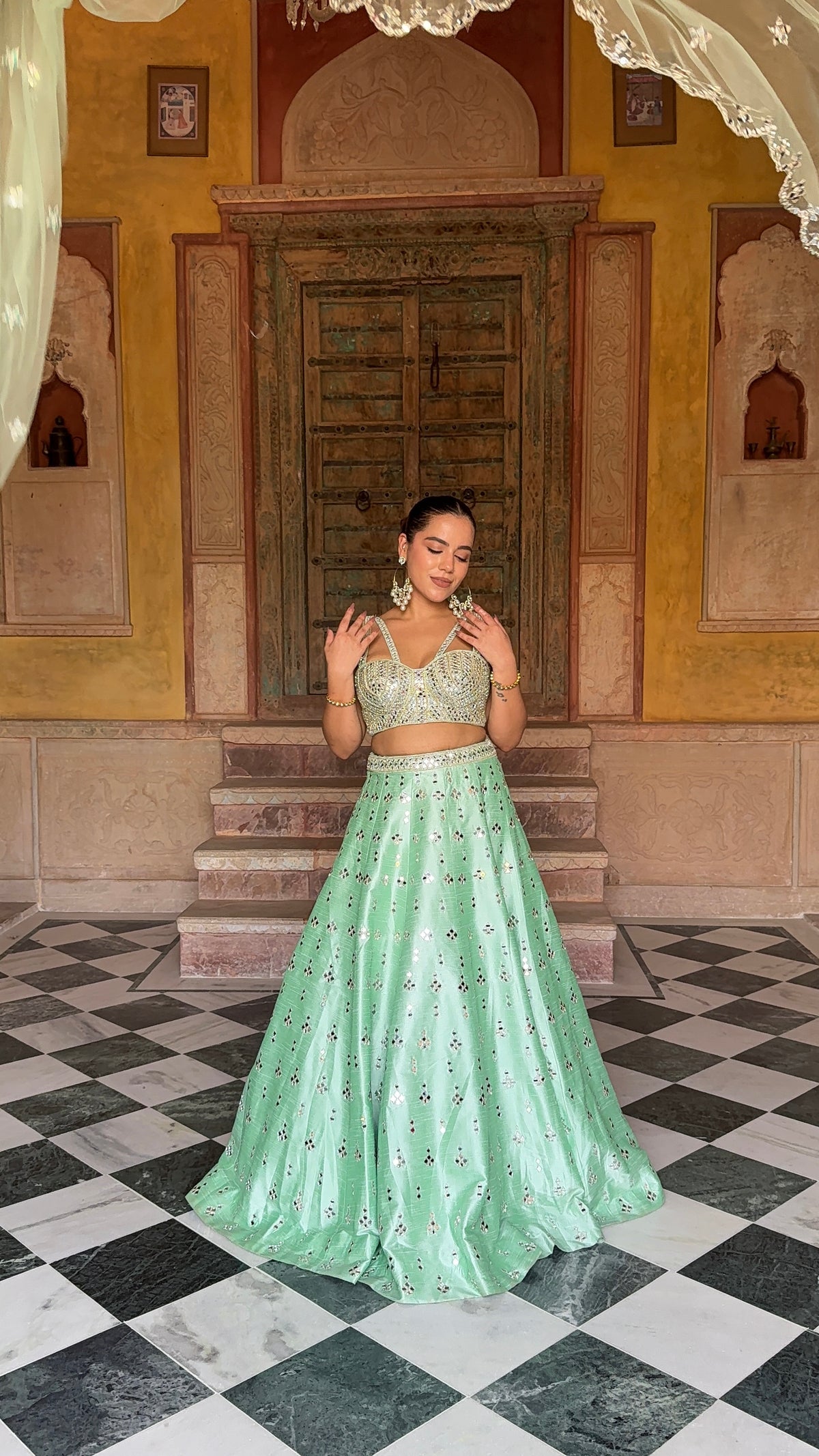 Elegant Raw Silk Lehenga with Intricate Mirror Work