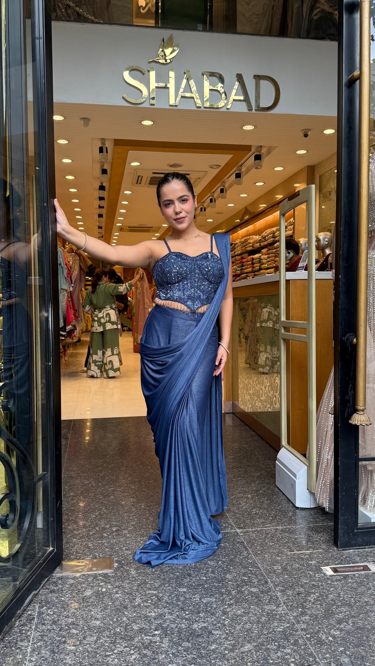 Shimmer Lycra Drape Saree with Handwork Corset Blouse