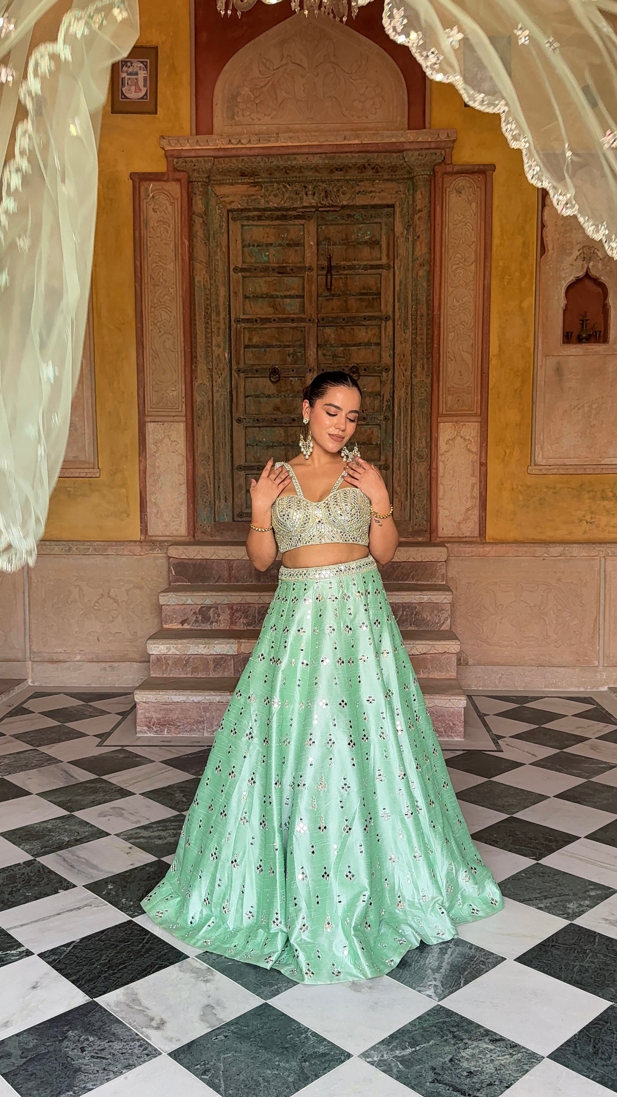 Elegant Raw Silk Lehenga with Intricate Mirror Work