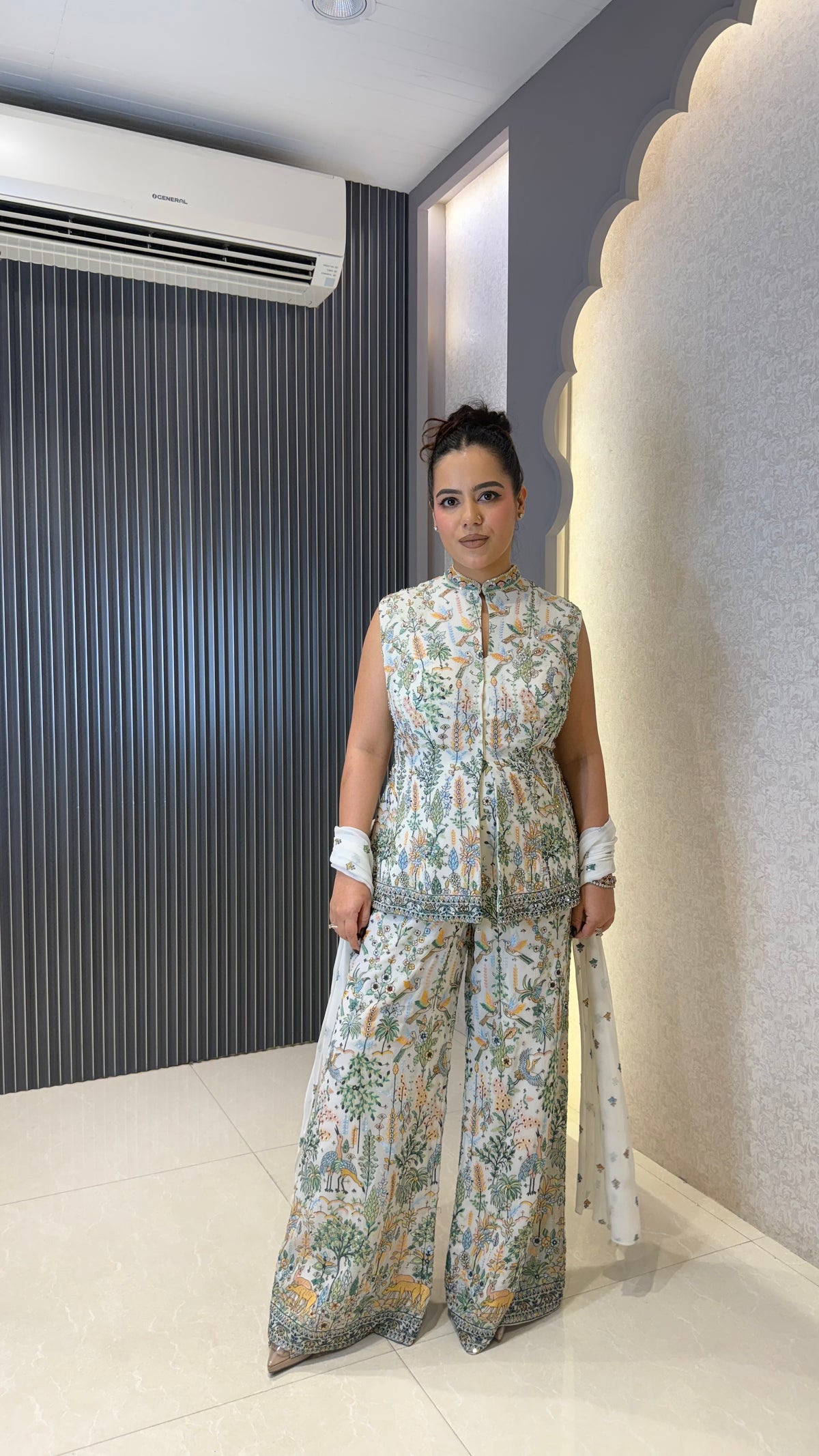 Thread embroidery work with sequin detailing