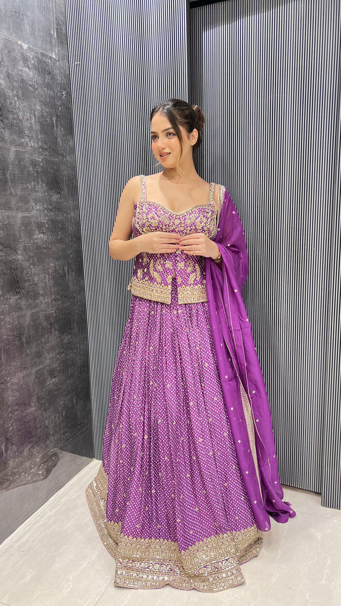 Bandani print lehenga with handwork blouse and jacket