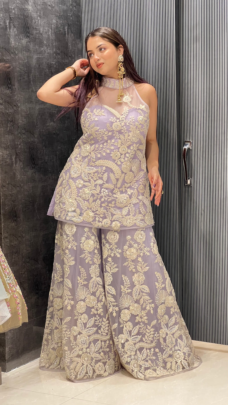 Exquisite Net Fabric Ensemble with Dori Work, Sequins, and White Cutdana Embellishments