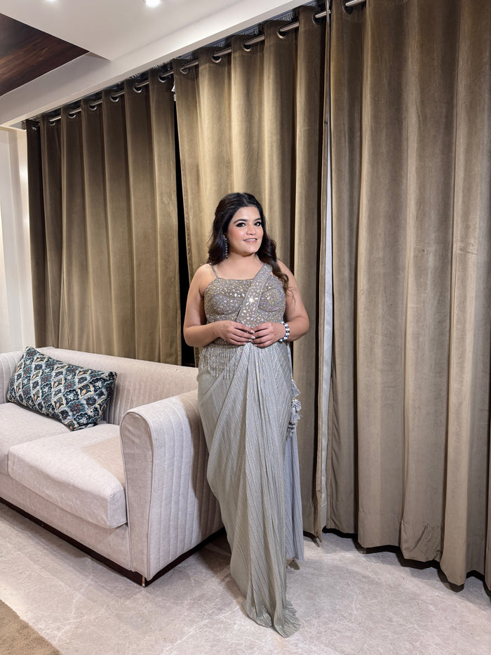 Drape saree with mirror work corset blouse