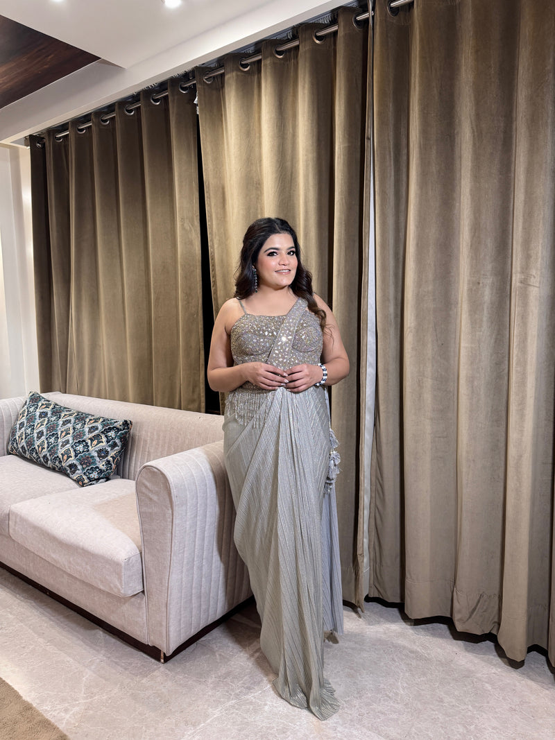 Drape saree with mirror work corset blouse