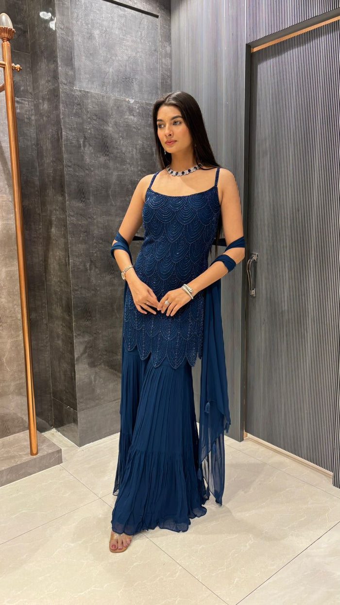 Elegance Unfolded: Pearl & Cutdana Georgette Suit Set